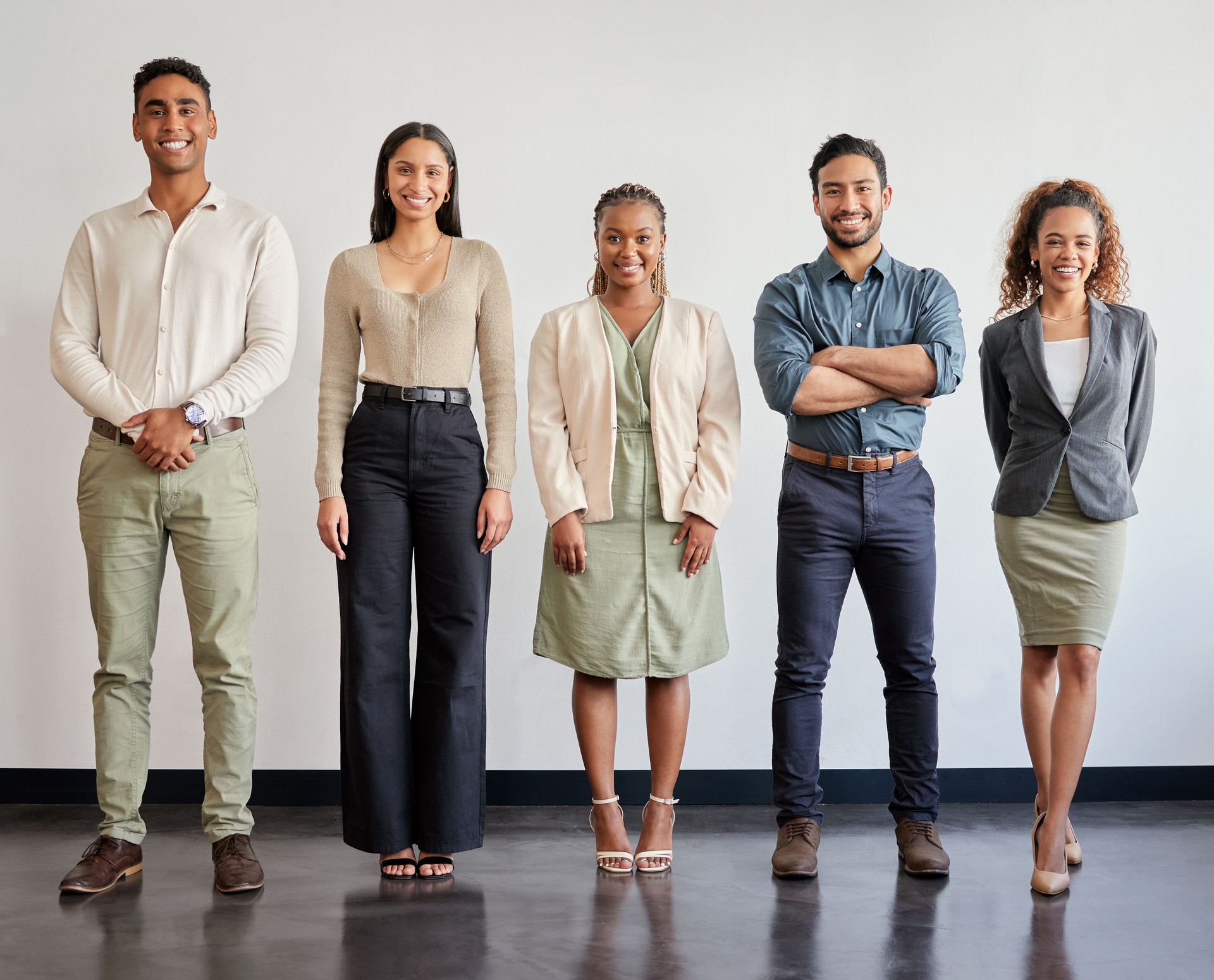 Portrait of a group of young businesspeople working together in a modern office